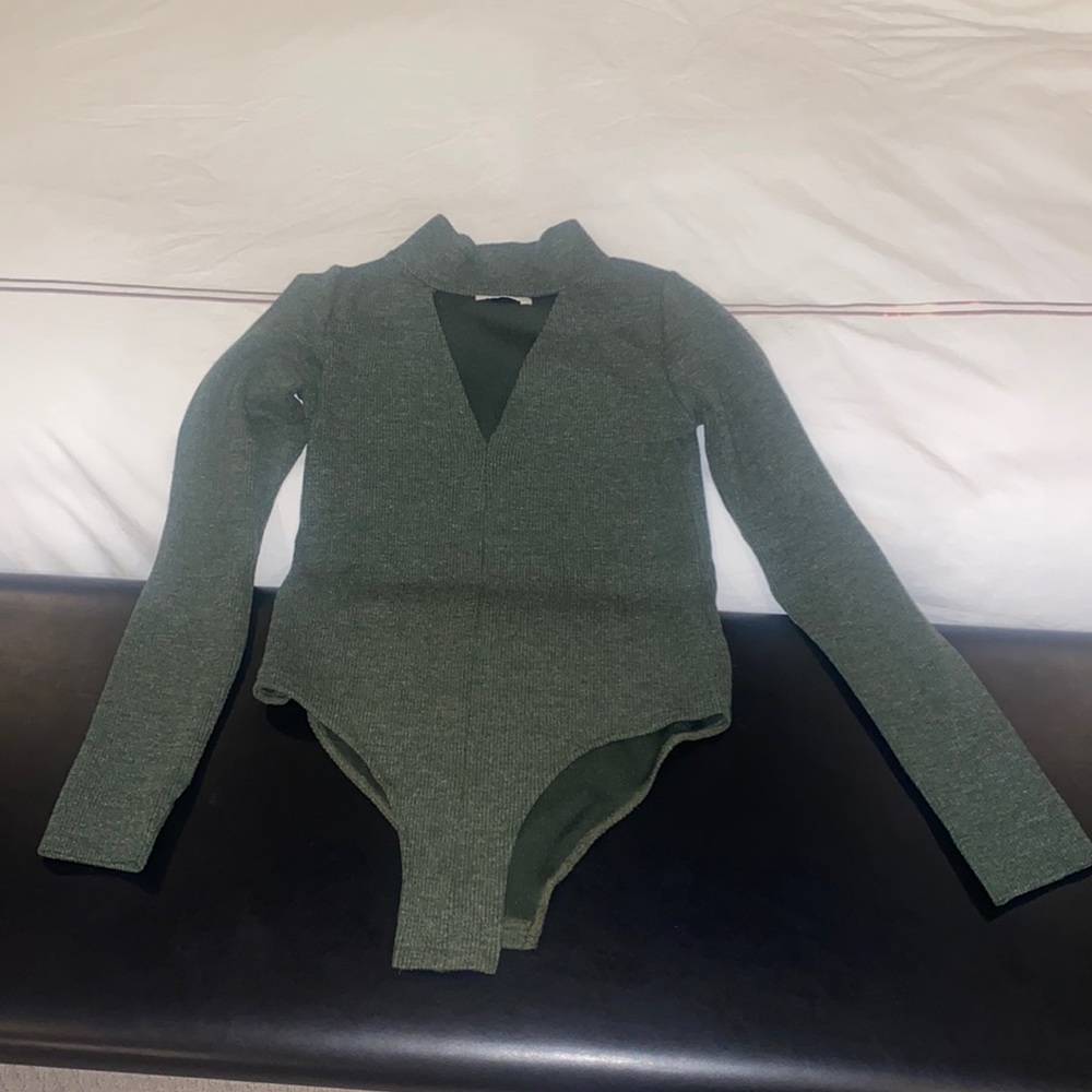 SIR green bodysuit